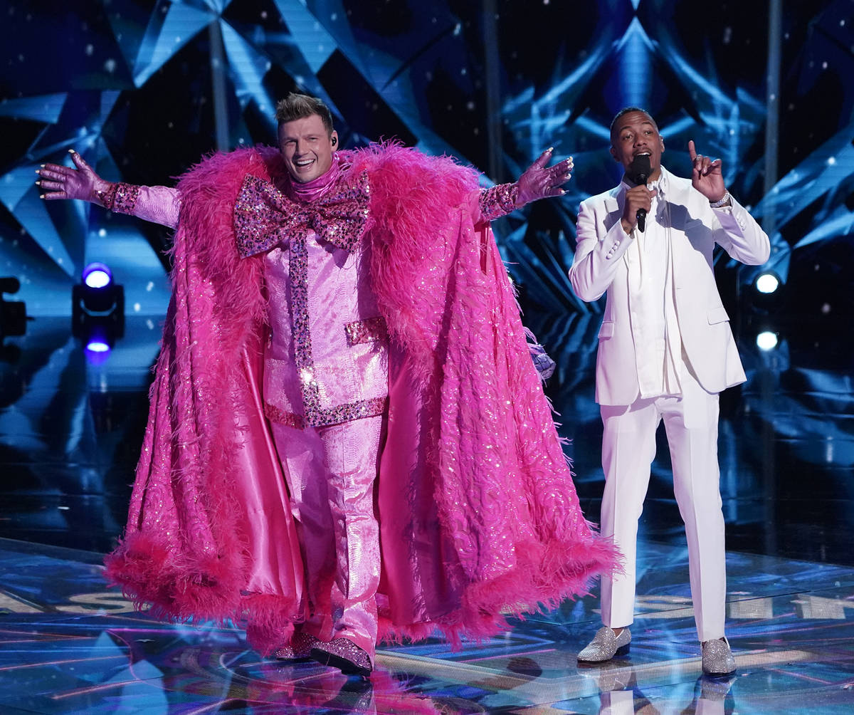 THE MASKED SINGER: L-R: Nick Carter and host Nick Cannon in the special two-hour "The Road ...
