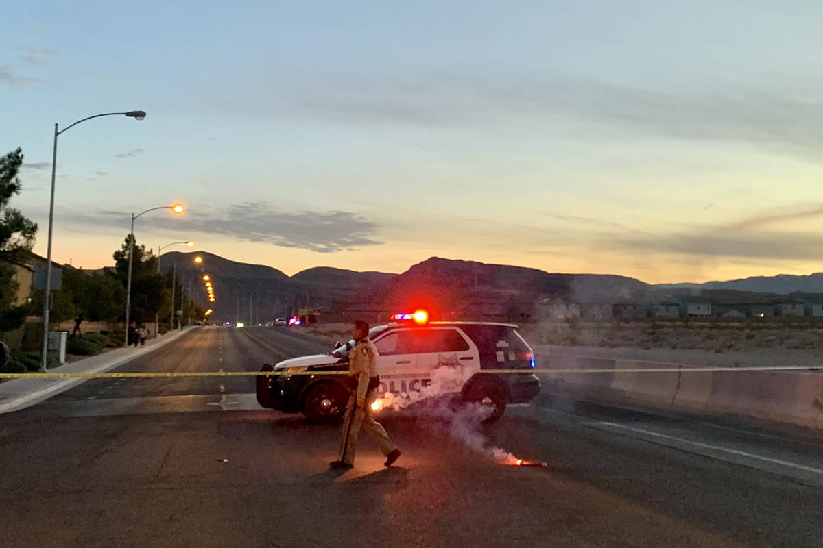 Police investigate a two-vehicle crash Wednesday, Dec. 30, 2020, at South Fort Apache Road and ...