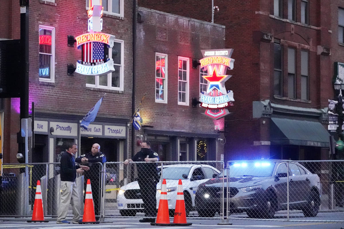 Police block off a part of the Broadway tourist district Monday, Dec. 28, 2020, as a result of ...