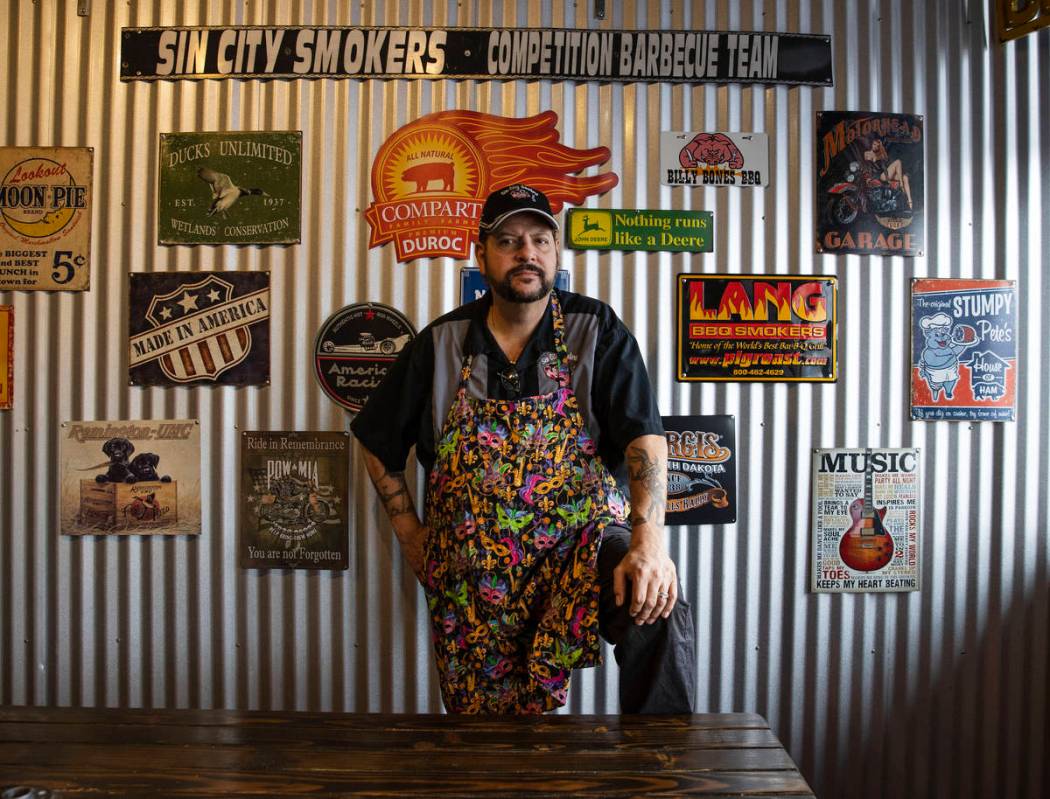 Steve Overlay, owner of Sin City Smokers Barbecue and Catering, poses for a photo at his Hender ...