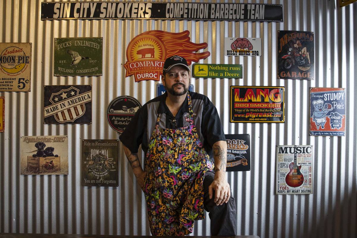 Steve Overlay, owner of Sin City Smokers Barbecue and Catering, poses for a photo at his Hender ...