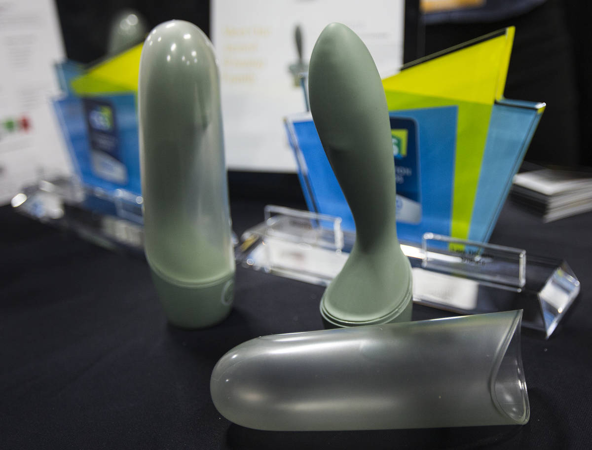 Onda, a robotic g-spot massager created by the sex toy company Lora DiCarlo, at their booth at ...