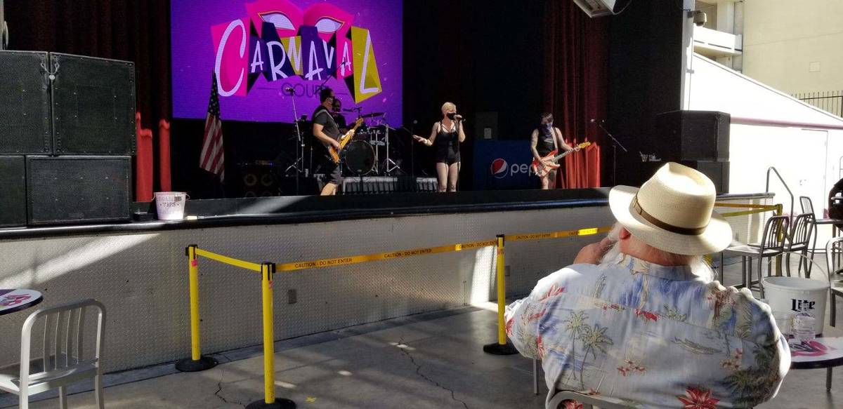 The Whip Its parody cover band is shown at Carnaval Court at Harrah's on Friday, June 26, 2020. ...