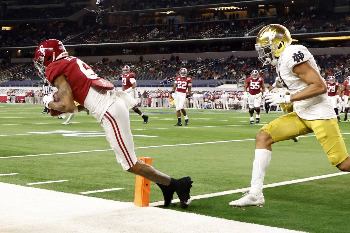 Alabama wide receiver DeVonta Smith (6) catches a pass in the end zone for a touchdown as Notre ...