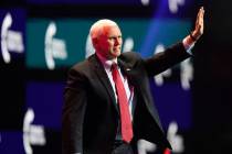 Vice President Mike Pence waves as he walks off the stage after speaking at the Turning Point U ...