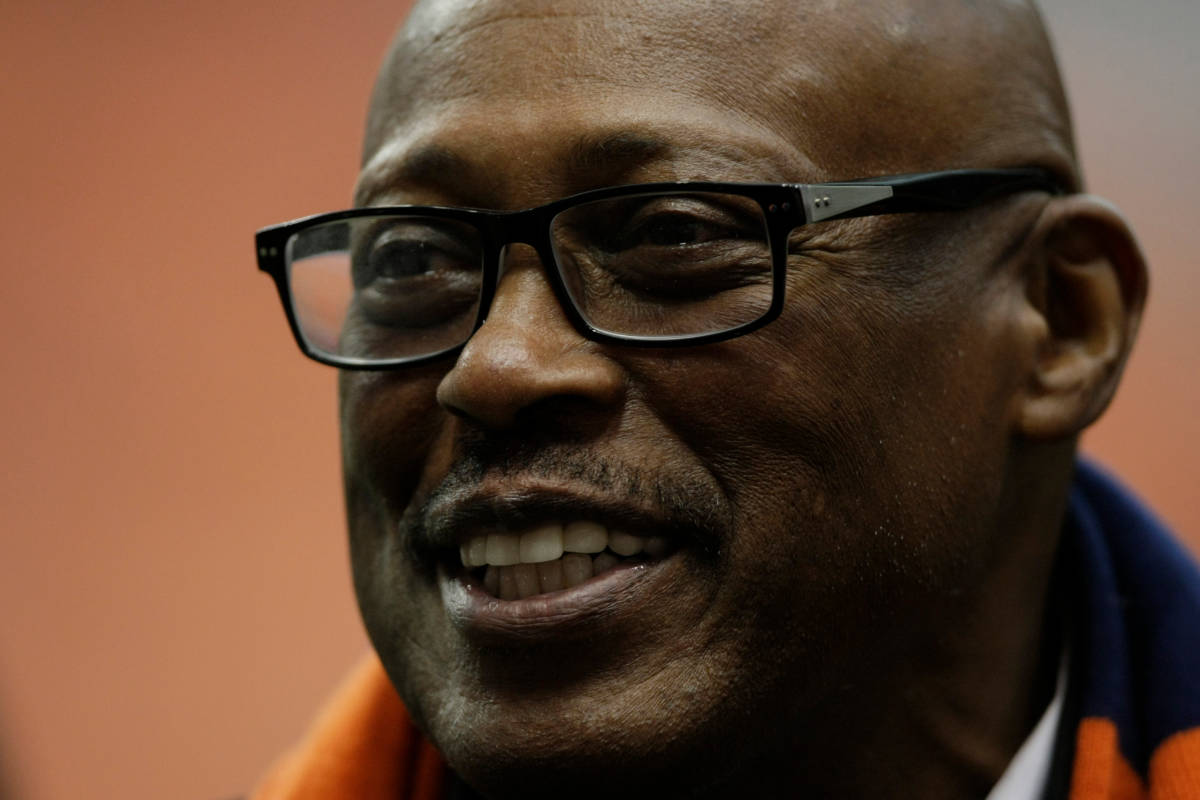 FILE - In this Nov. 30, 2013, file photo, NFL great Floyd Little talks to players on the sideli ...