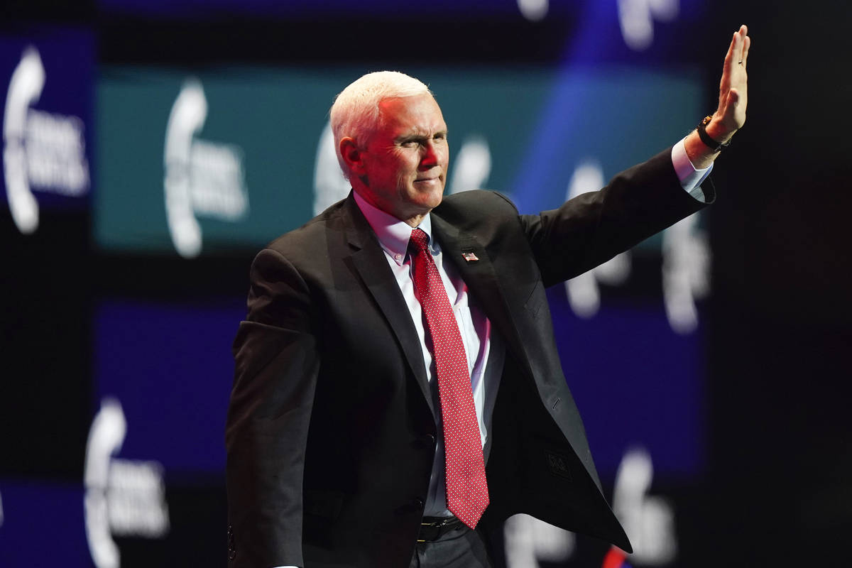 Vice President Mike Pence waves as he walks off the stage after speaking at the Turning Point U ...