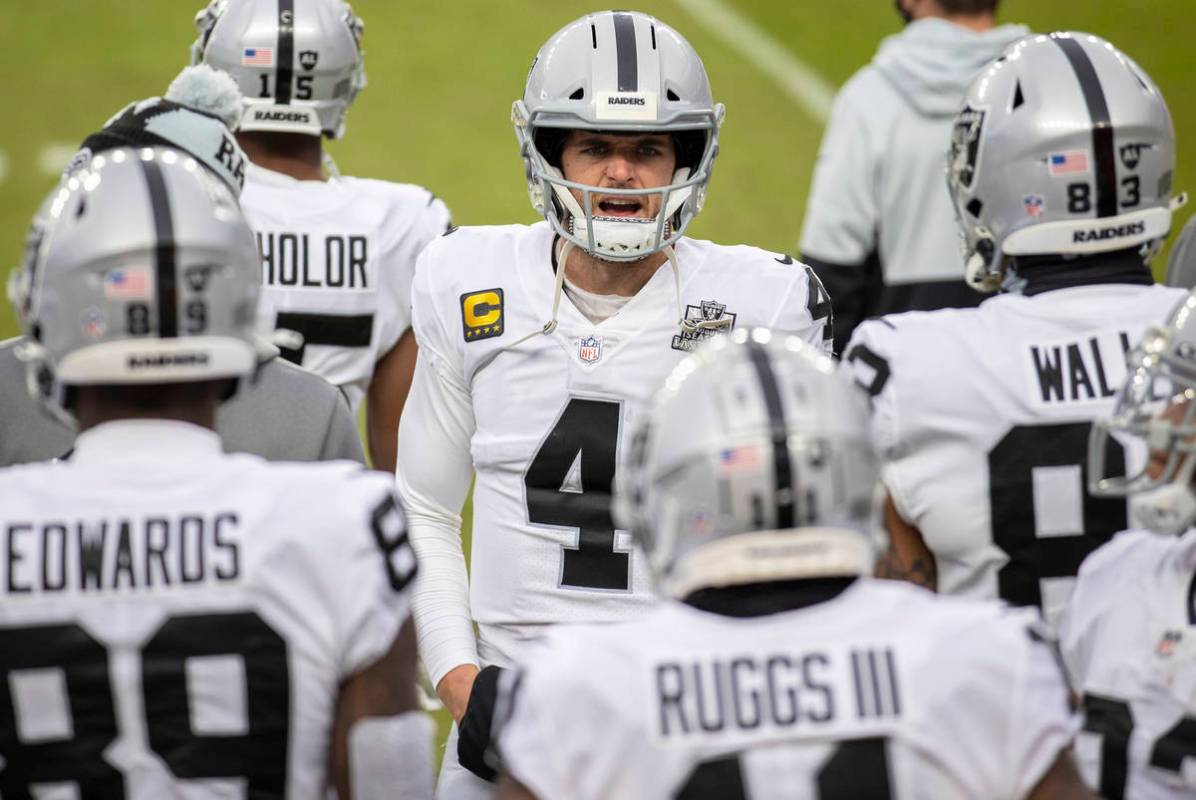 Raiders quarterback Derek Carr (4) fires up his team in the second quarter during an NFL footba ...