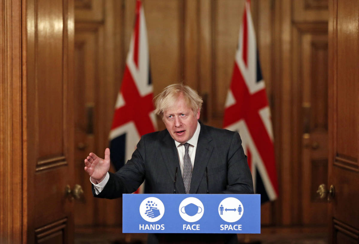 FILE - In this Wednesday Dec. 30, 2020 file photo, Britain's Prime Minister Boris Johnson speak ...