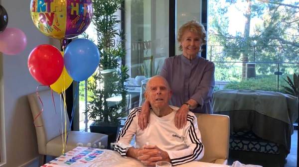 Charles Heers and his wife, Marilyn, are shown at his 94th birthday celebration in Newport Beac ...