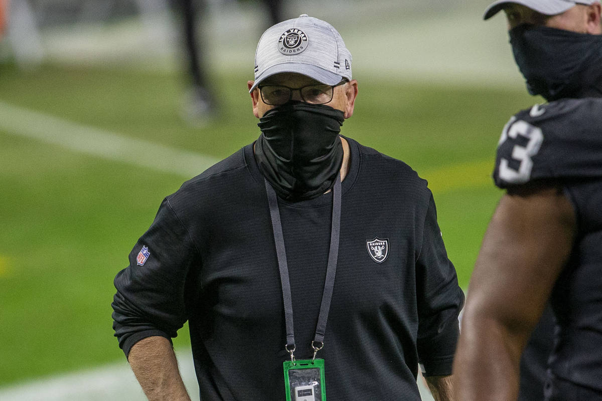 Raiders defensive coordinator Rod Marinelli watches as the team warms up prior an NFL football ...
