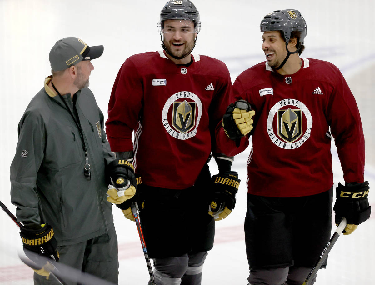 Golden Knights Coach Pete DeBoer, from left, forward William Carrier and forward Ryan Reaves on ...