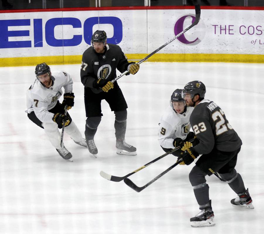 Golden Knights, from left, defenseman Alex Pietrangelo (7), defenseman Shea Theodore (27), forw ...