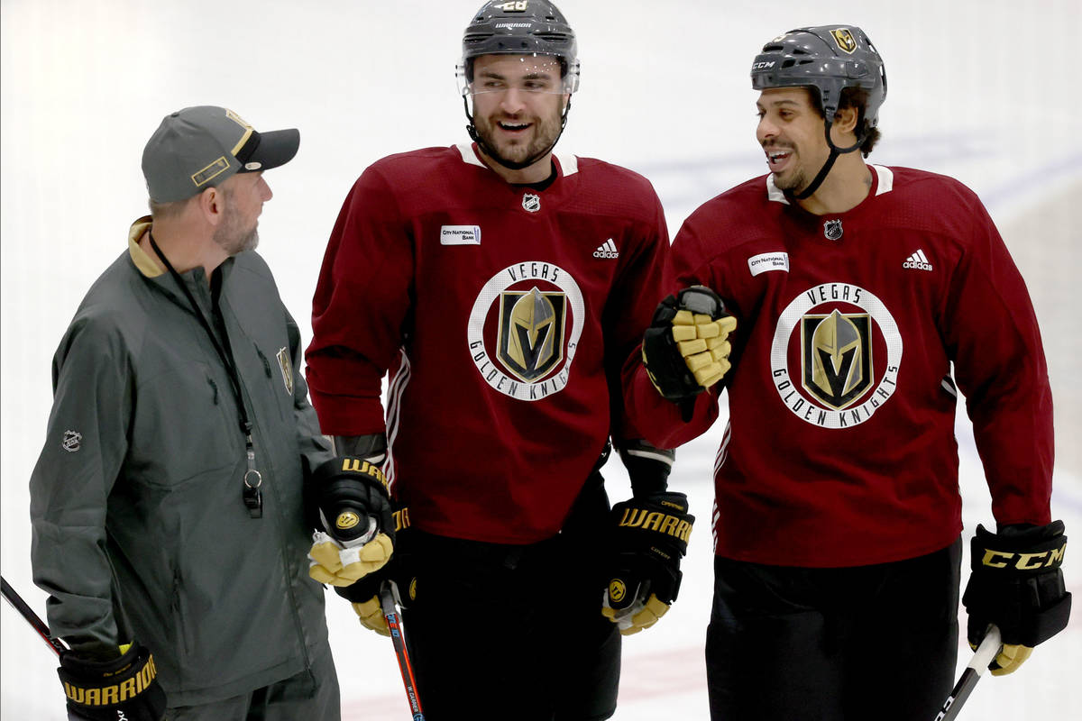 Golden Knights Coach Pete DeBoer, from left, forward William Carrier and forward Ryan Reaves on ...