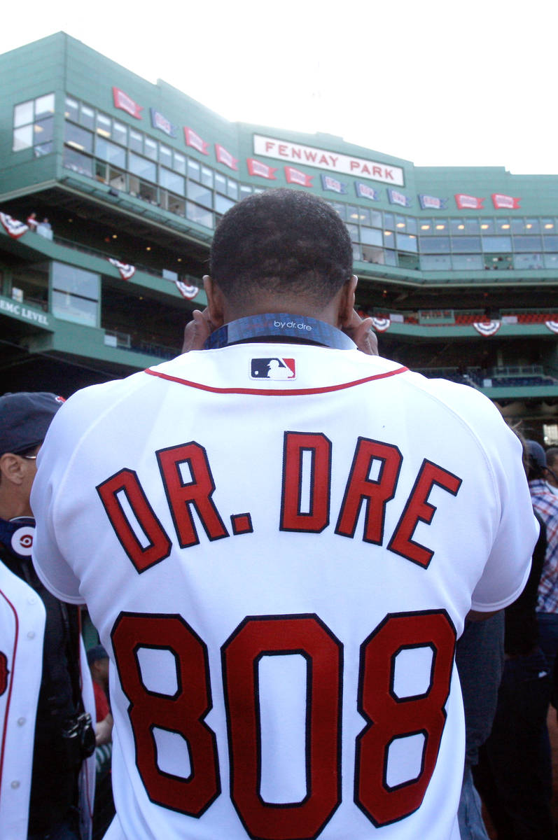Artist and producer Dr. Dre before he takes batting practice before the opening game of the bas ...