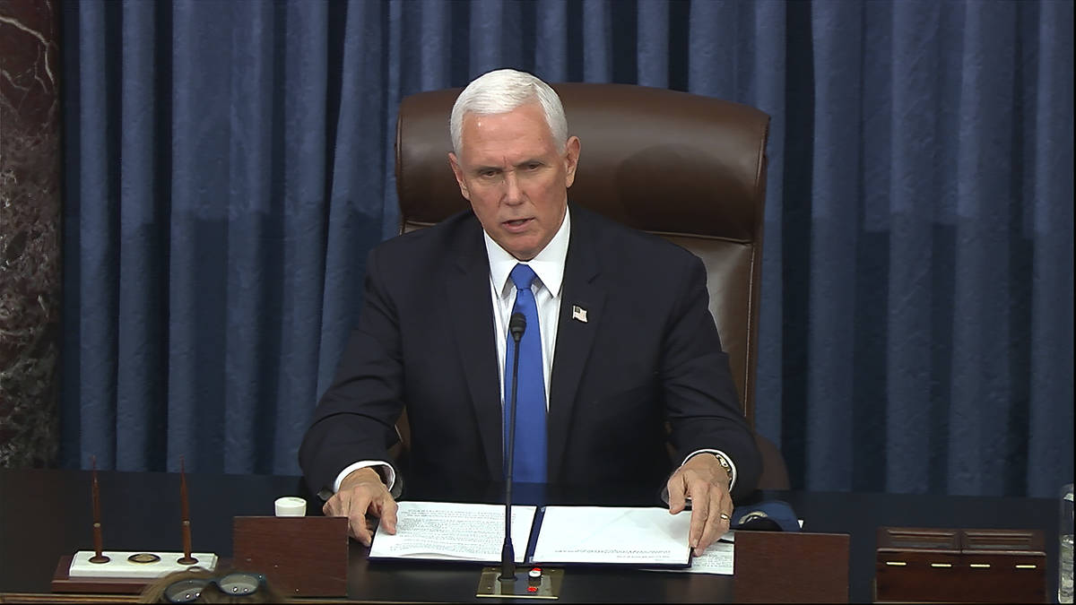 In this image from video, Vice President Mike Pence speaks as the Senate reconvenes after prote ...