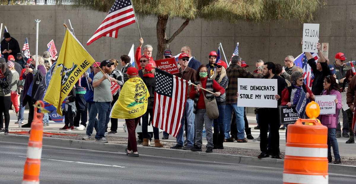Pro-Trump protesters rally outside the Lloyd George U.S. Courthouse in downtown Las Vegas Wedne ...