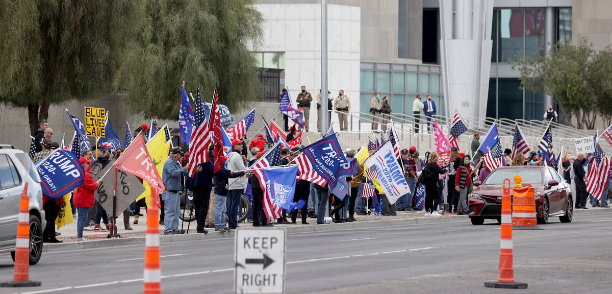 Pro-Trump protesters rally outside the Lloyd George U.S. Courthouse in downtown Las Vegas Wedne ...