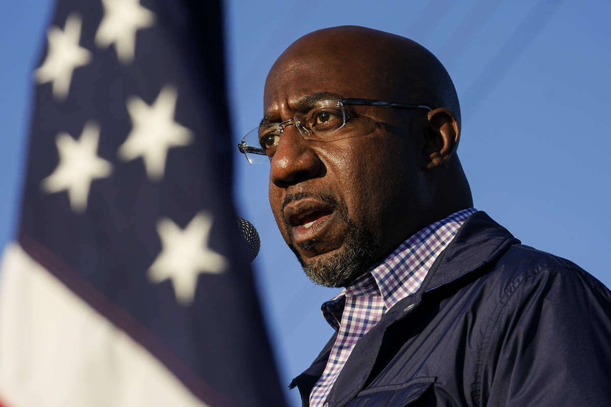 FILE - In this Nov. 15, 2020, file photo Raphael Warnock, a Democratic candidate for the U.S. S ...