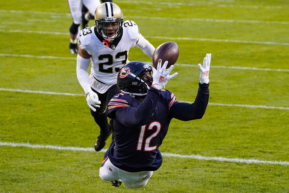 Chicago Bears wide receiver Allen Robinson (12) makes a catch for a touchdown in front of New O ...
