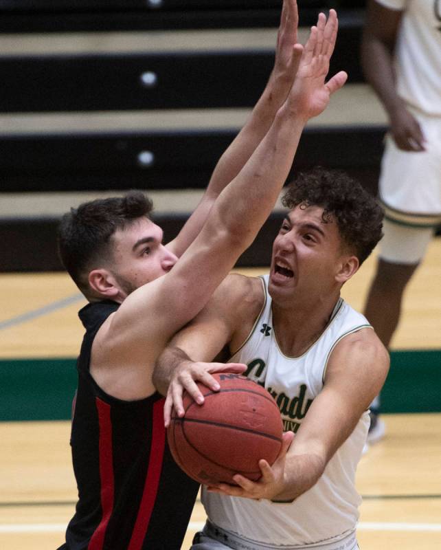 Colorado State guard Isaiah Rivera, right, shoots as UNLV forward Edoardo Del Cadia defends dur ...