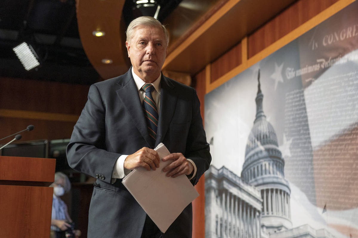 Sen. Lindsey Graham, R-S.C., speaks to reporters during a news conference at the Capitol, Thurs ...