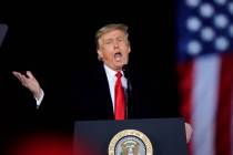 President Donald Trump speaks at a campaign rally in support of Senate candidates Sen. Kelly Lo ...