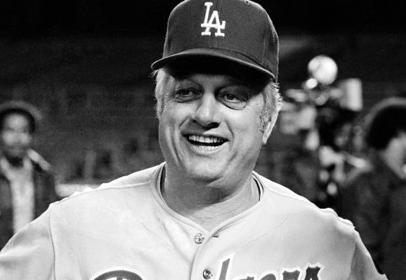 Los Angeles Dodgers manager Tom Lasorda is the picture of joviality as he jokes and answers rep ...