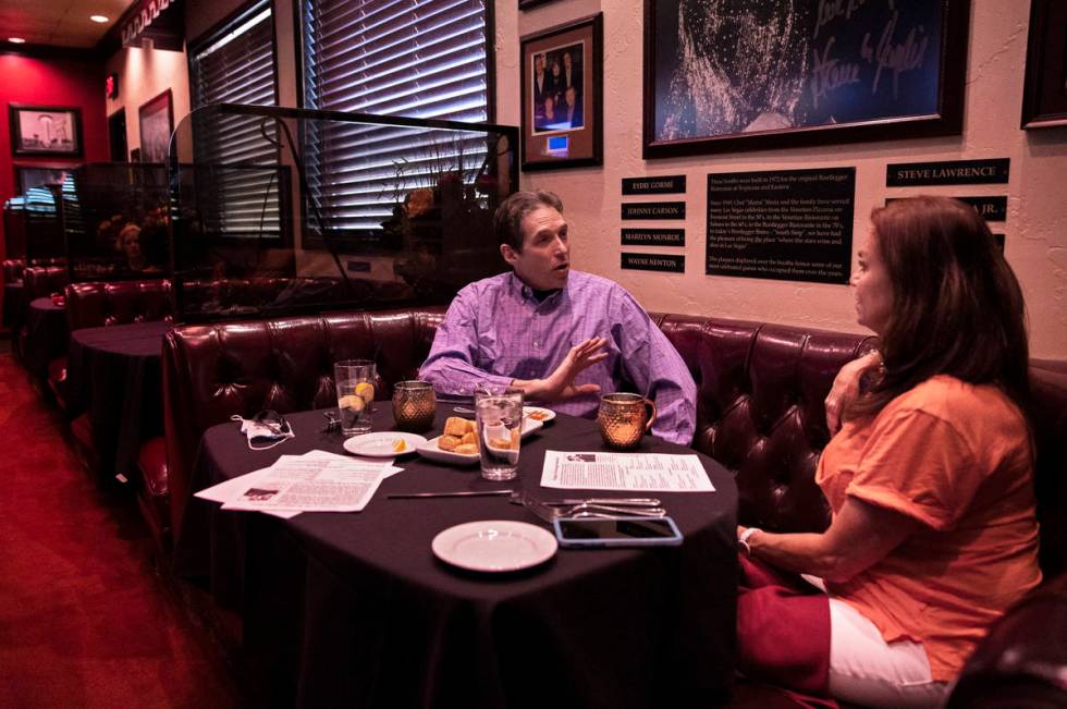 Guests enjoy an early dinner at Bootlegger Bistro on Wednesday, Aug. 5, 2020, in Las Vegas. (Be ...