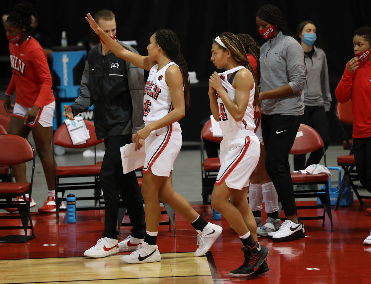 UNLV Lady Rebels guards Jade Thomas, left, and Bailey Thomas enter the second quarter against C ...