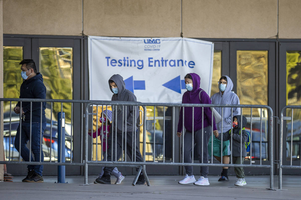 Patients enter as COVID-19 testing continues at the Cashman Center by University Medical Center ...