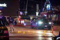 Chicago and Evanston police investigate a crime scene after a gunman went on a shooting spree b ...