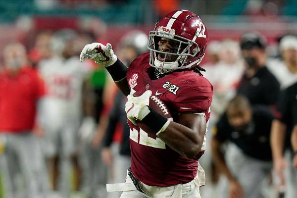 Alabama running back Najee Harris scores a touchdown against Ohio State during the first half o ...