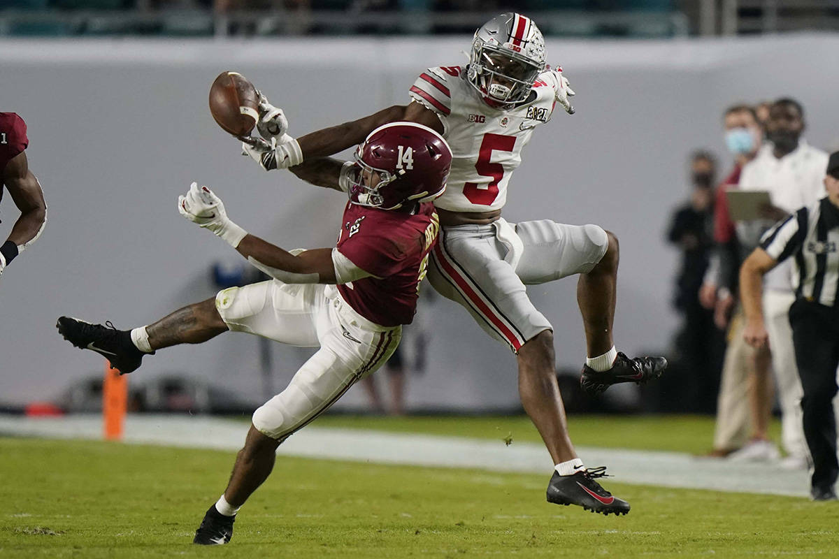 Alabama defensive back Brian Branch breaks up a pass intended for Alabama wide receiver Javon B ...