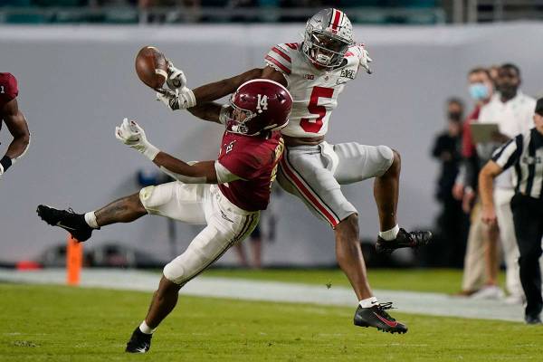 Alabama defensive back Brian Branch breaks up a pass intended for Alabama wide receiver Javon B ...