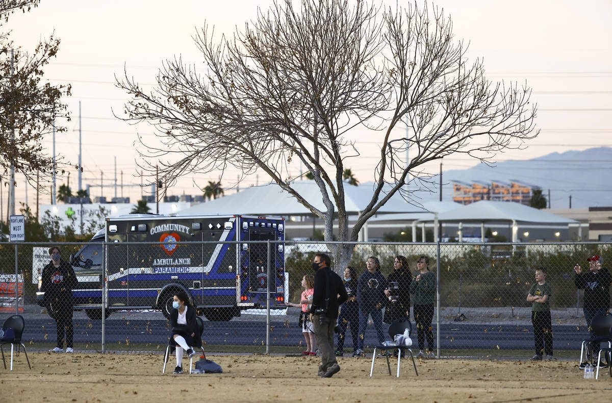 People watch the action from the sidewalk as Amplus Academy takes on SLAM! Nevada during a flag ...