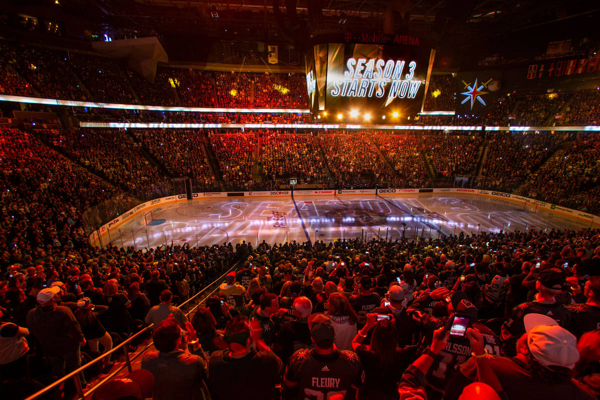 Season 3 starts sign above the crowd and on the ice before the start of the first period of the ...