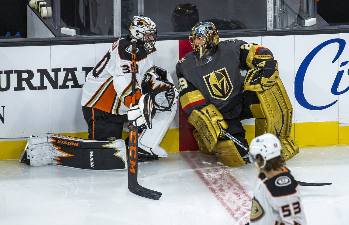 Golden Knights goaltender Marc-Andre Fleury (29) and Anaheim Ducks goaltender Ryan Miller (30) ...