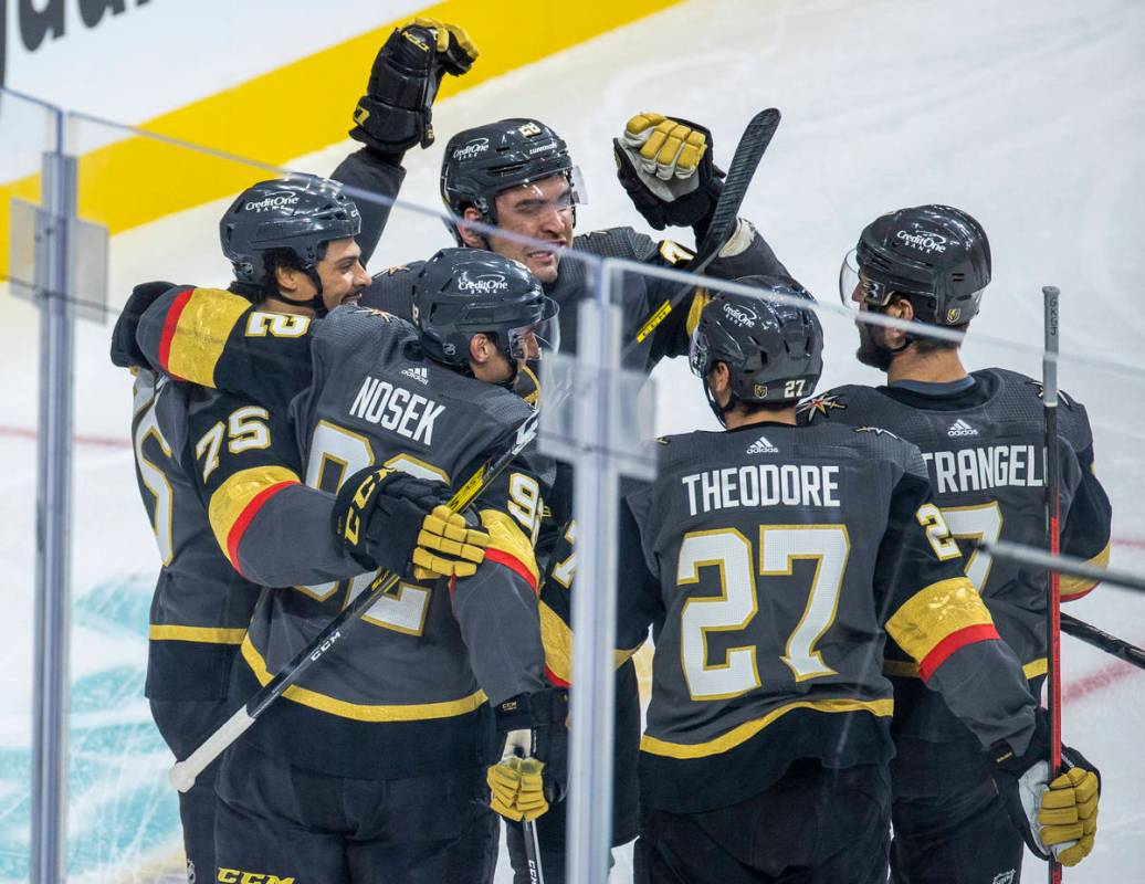 Golden Knights right wing Tomas Nosek (92) celebrates his goal with teammates versus the Anahei ...