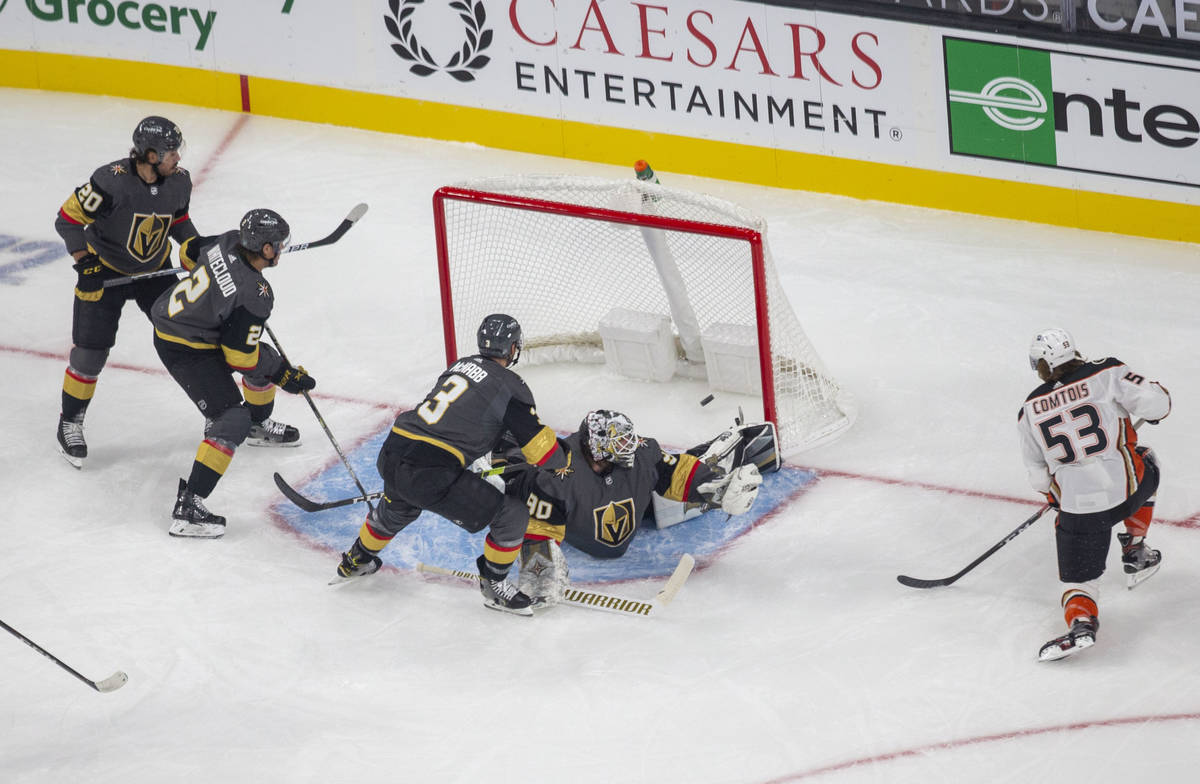 Anaheim Ducks forward Max Comtois (53) scores a goal past Vegas Golden Knights goaltender Robin ...