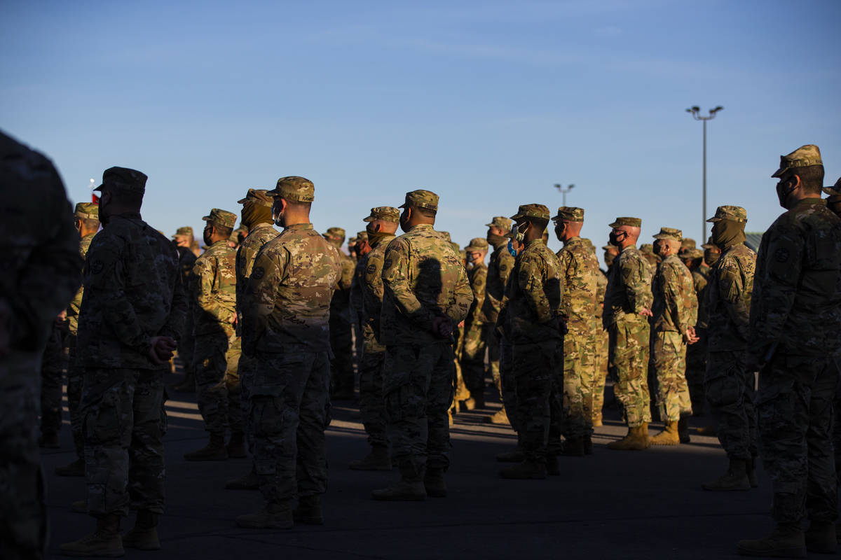 Members of the Nevada Army Guard listen to Maj. Gen. Ondra Berry, not pictured, on Thursday, Ja ...