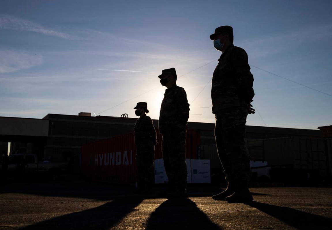 Members of the Nevada Army Guard listen to Maj. Gen. Ondra Berry, not pictured, on Thursday, Ja ...