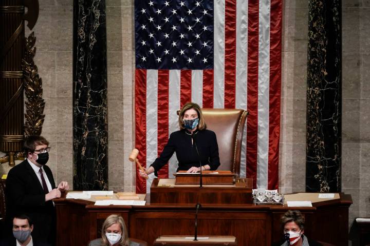 Speaker of the House Nancy Pelosi, D-Calif., gavels in the final vote of the impeachment of Pre ...