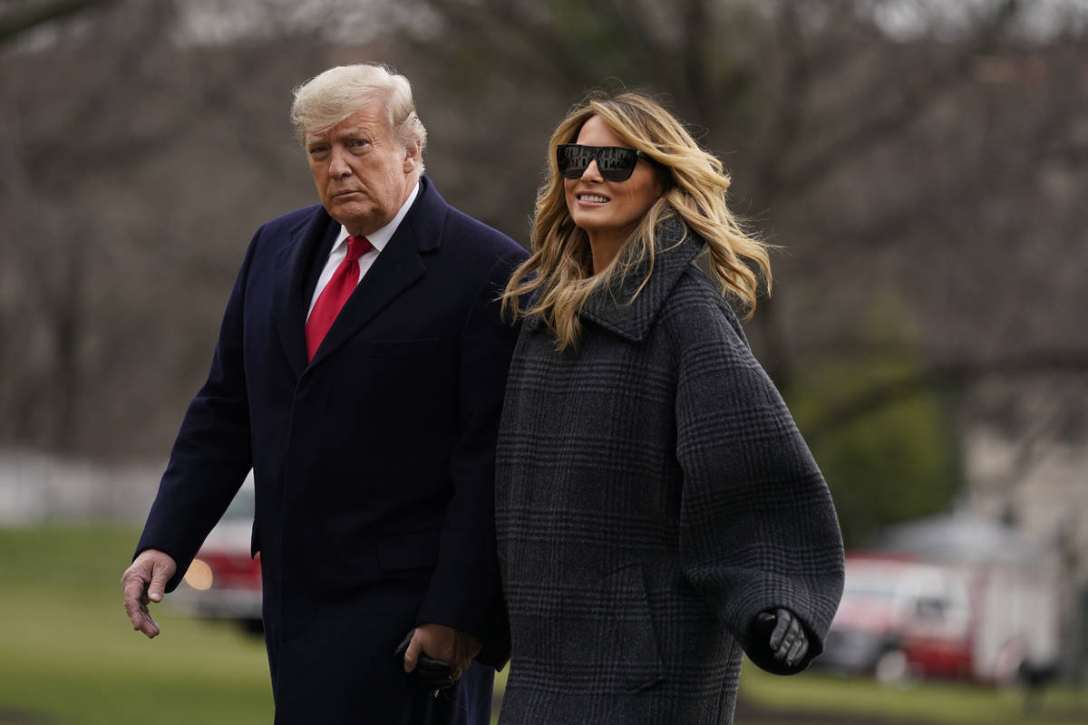 President Donald Trump and first lady Melania Trump arrive on the South Lawn of the White House ...
