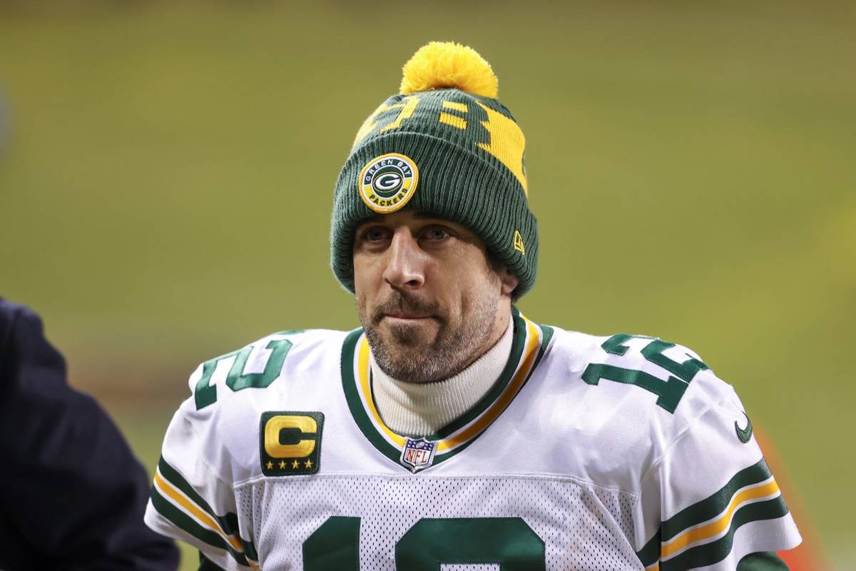 Green Bay Packers quarterback Aaron Rodgers (12) walks off the field after an NFL football game ...