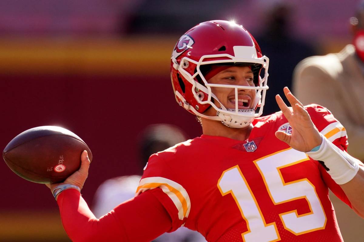 Kansas City Chiefs quarterback Patrick Mahomes throws before an NFL football game against the A ...