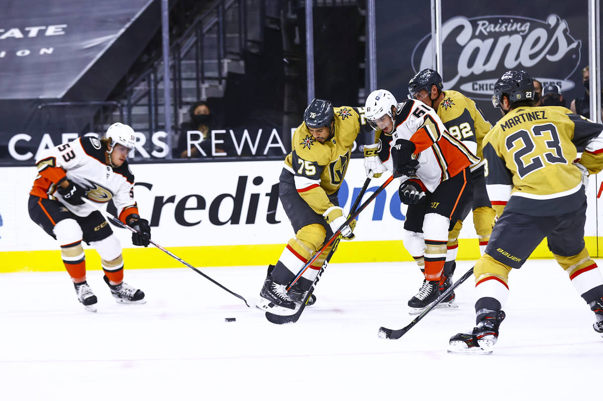 Golden Knights right wing Ryan Reaves (75) battles for the puck against Anaheim Ducks left wing ...