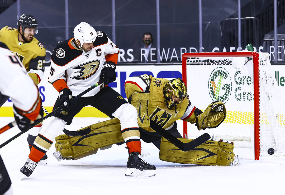 Golden Knights goaltender Marc-Andre Fleury (29) blocks the puck in front of Anaheim Ducks cent ...