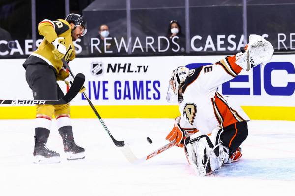 Anaheim Ducks goaltender John Gibson (36) blocks a shot by Golden Knights center Chandler Steph ...