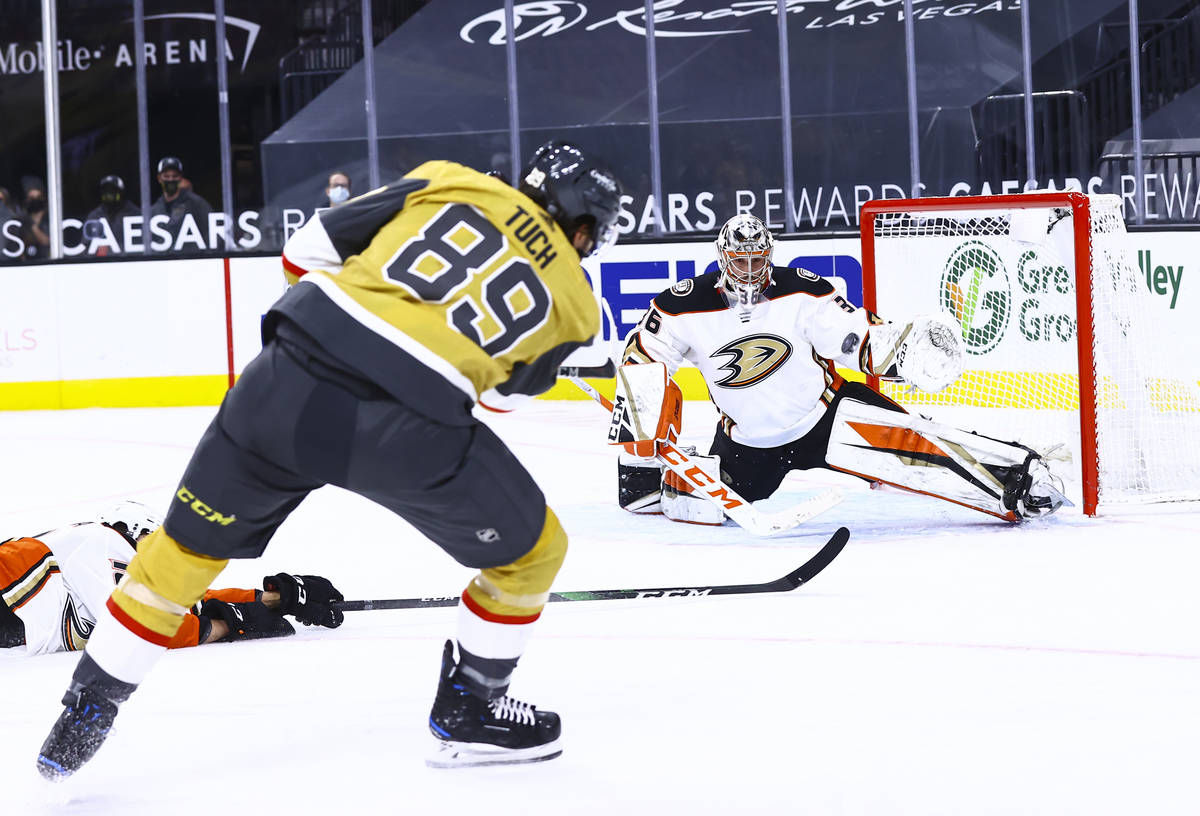 Anaheim Ducks goaltender John Gibson (36) blocks a shot from Golden Knights right wing Alex Tuc ...